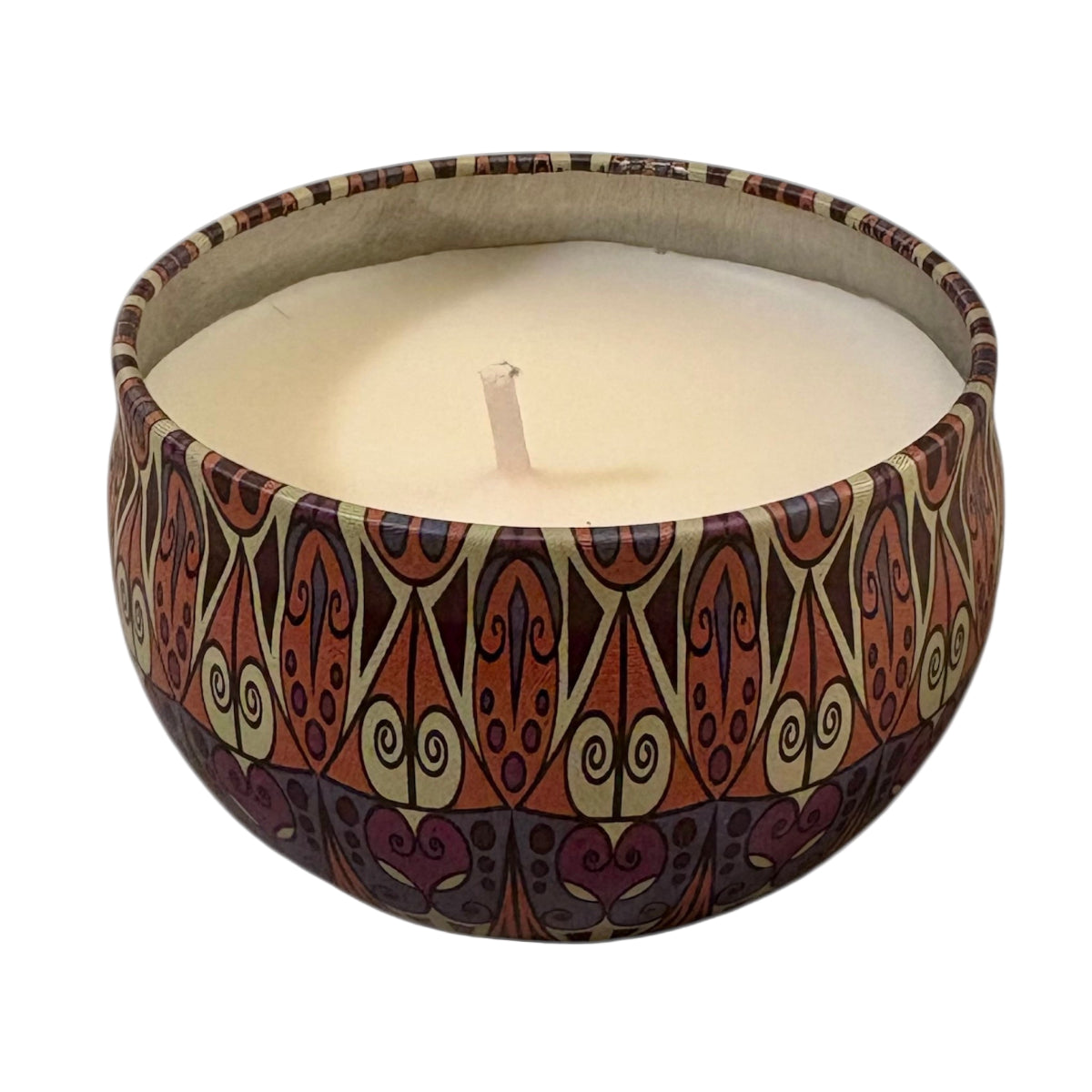 Candle in a decorative container with a pattern on a white background